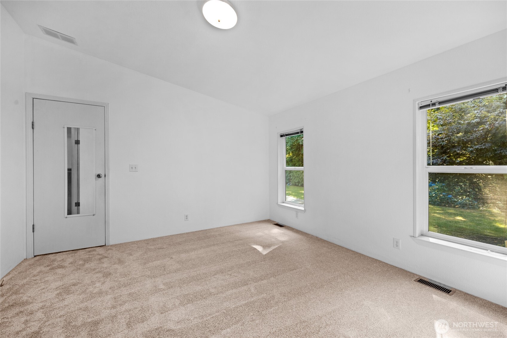22222 49th Avenue Southeast Bothell, WA 98021 - Photo 14 of 37 a view of an empty room with a window