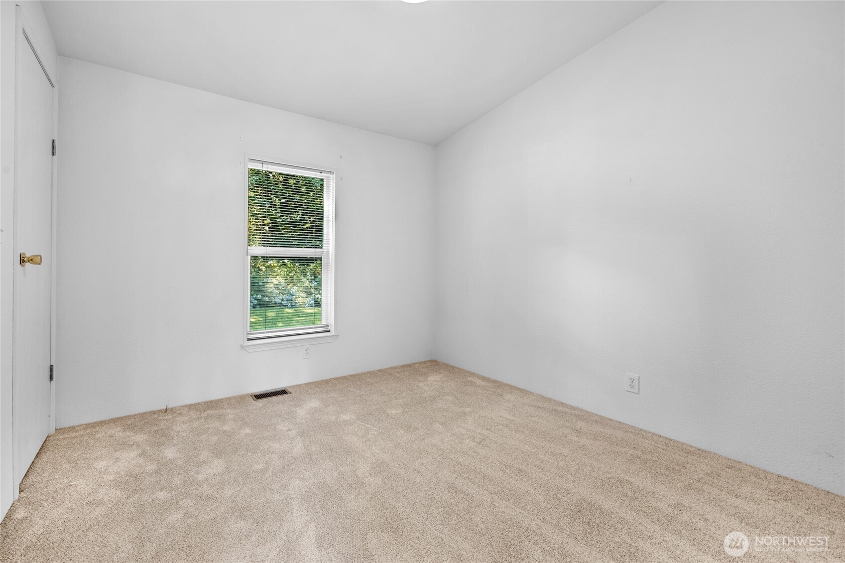 22222 49th Avenue Southeast Bothell, WA 98021 - Photo 15 of 37 an empty room with a window