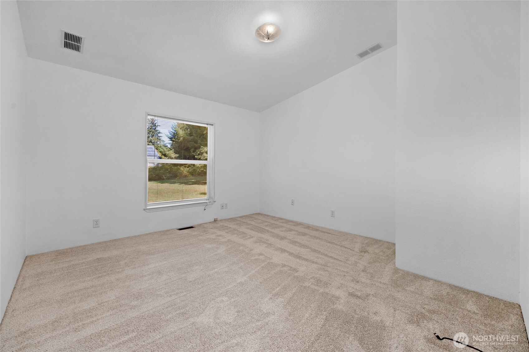 22222 49th Avenue Southeast Bothell, WA 98021 - Photo 18 of 37 an empty room with windows