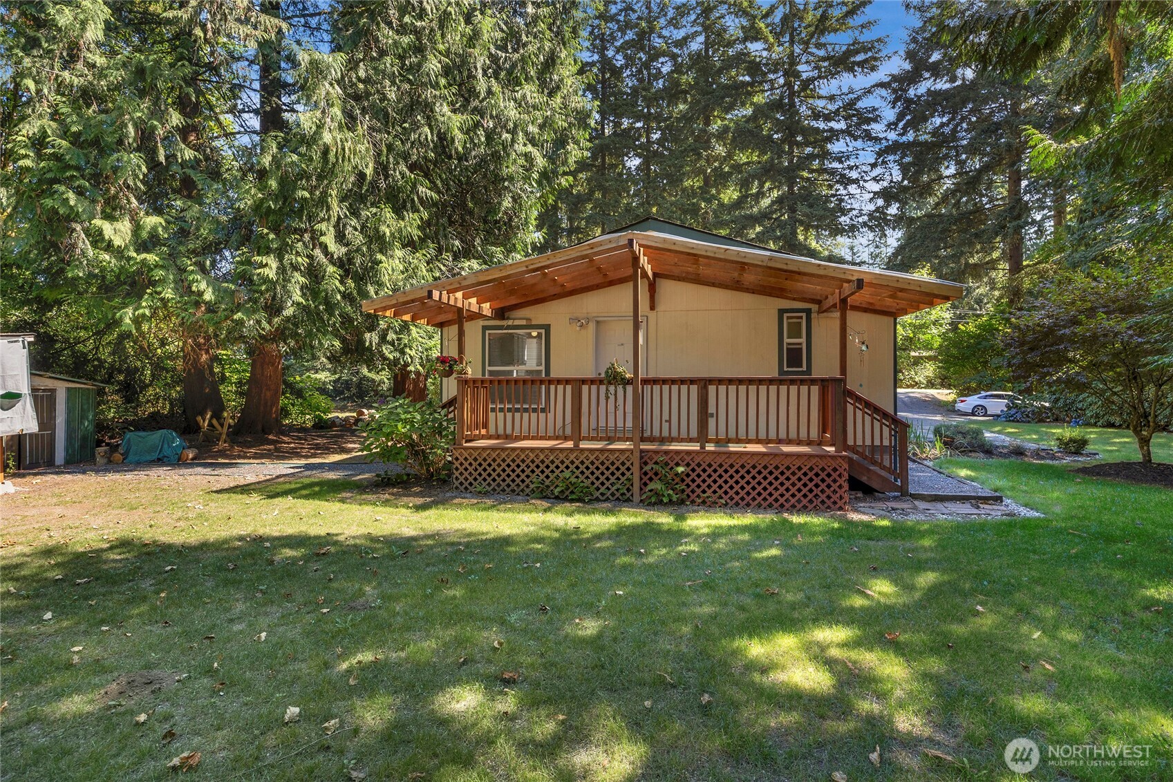 22222 49th Avenue Southeast Bothell, WA 98021 - Photo 22 of 37 a view of a house with a yard