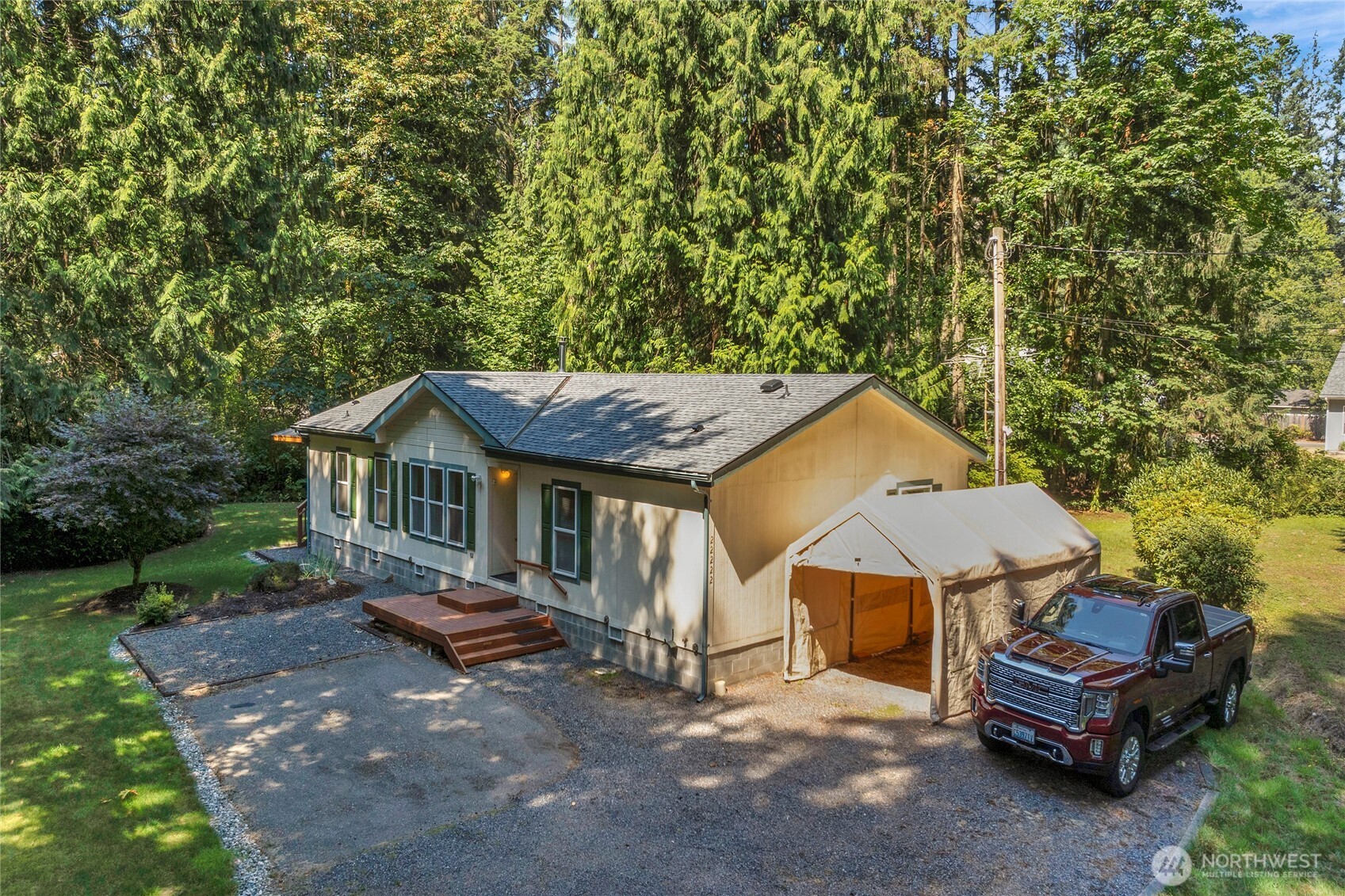 22222 49th Avenue Southeast Bothell, WA 98021 - Photo 37 of 37 a view of a house with a yard and sitting area