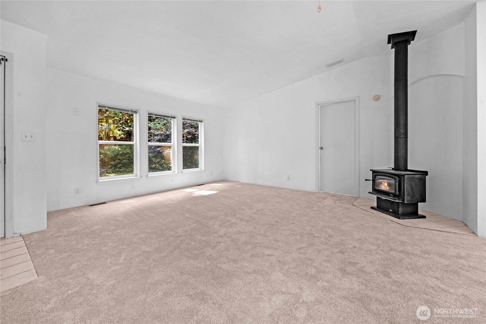 22222 49th Avenue Southeast Bothell, WA 98021 - Photo 4 of 37 a view of an empty room with windows