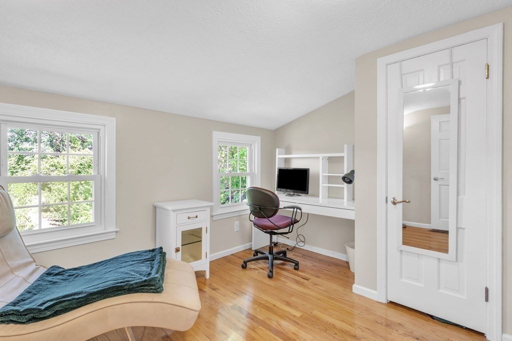 83 Moss Road Springfield, MA 01119 - Photo 27 of 42 a workspace with wooden floor and a window