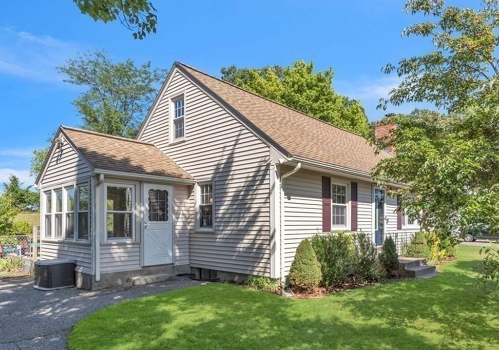 83 Moss Road Springfield, MA 01119 - Photo 4 of 42 a view of a house with a yard plants and large tree