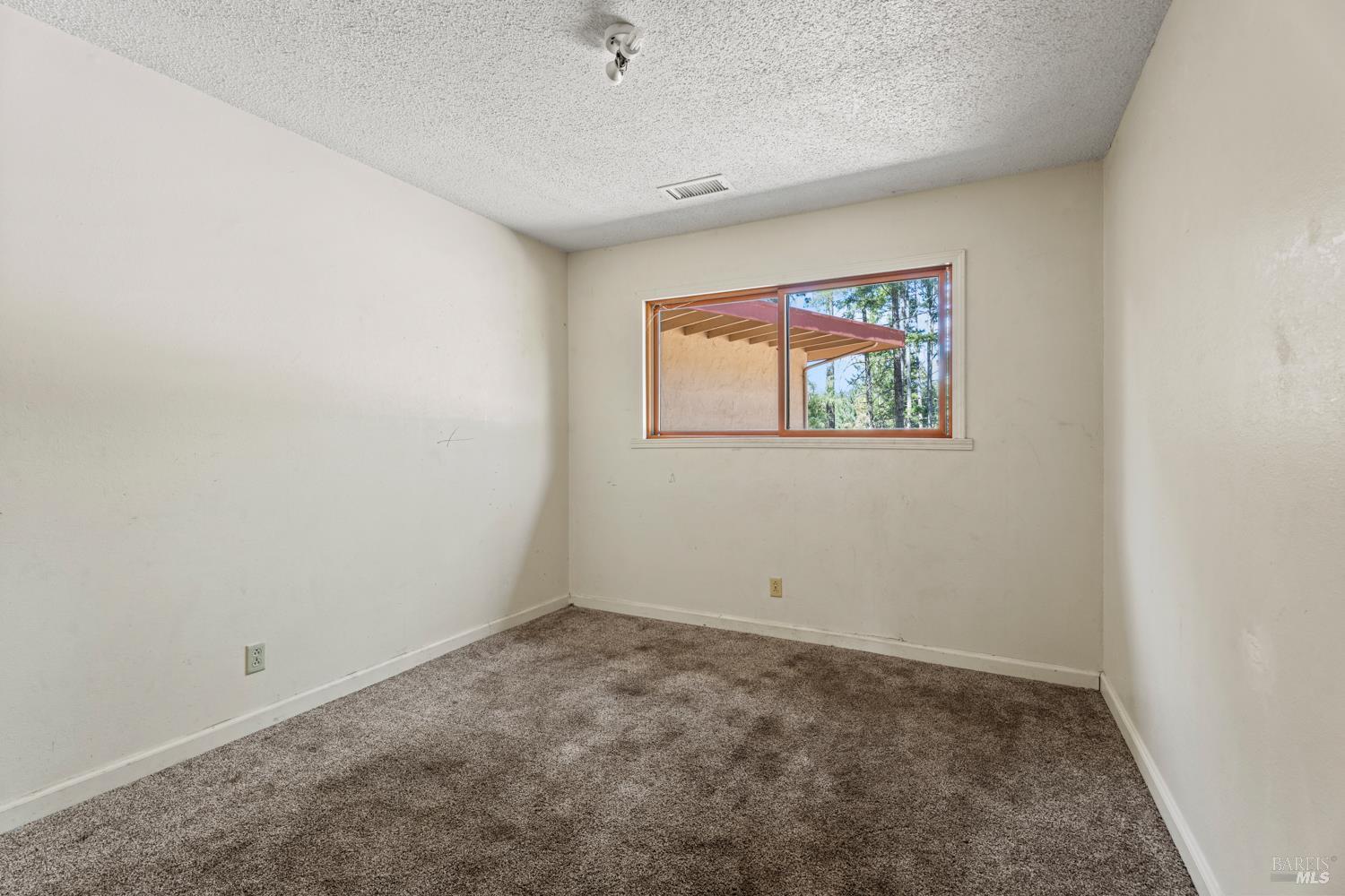 3781 Ridgewood Road Willits, CA 95490 - Photo 12 of 18 an empty room with windows