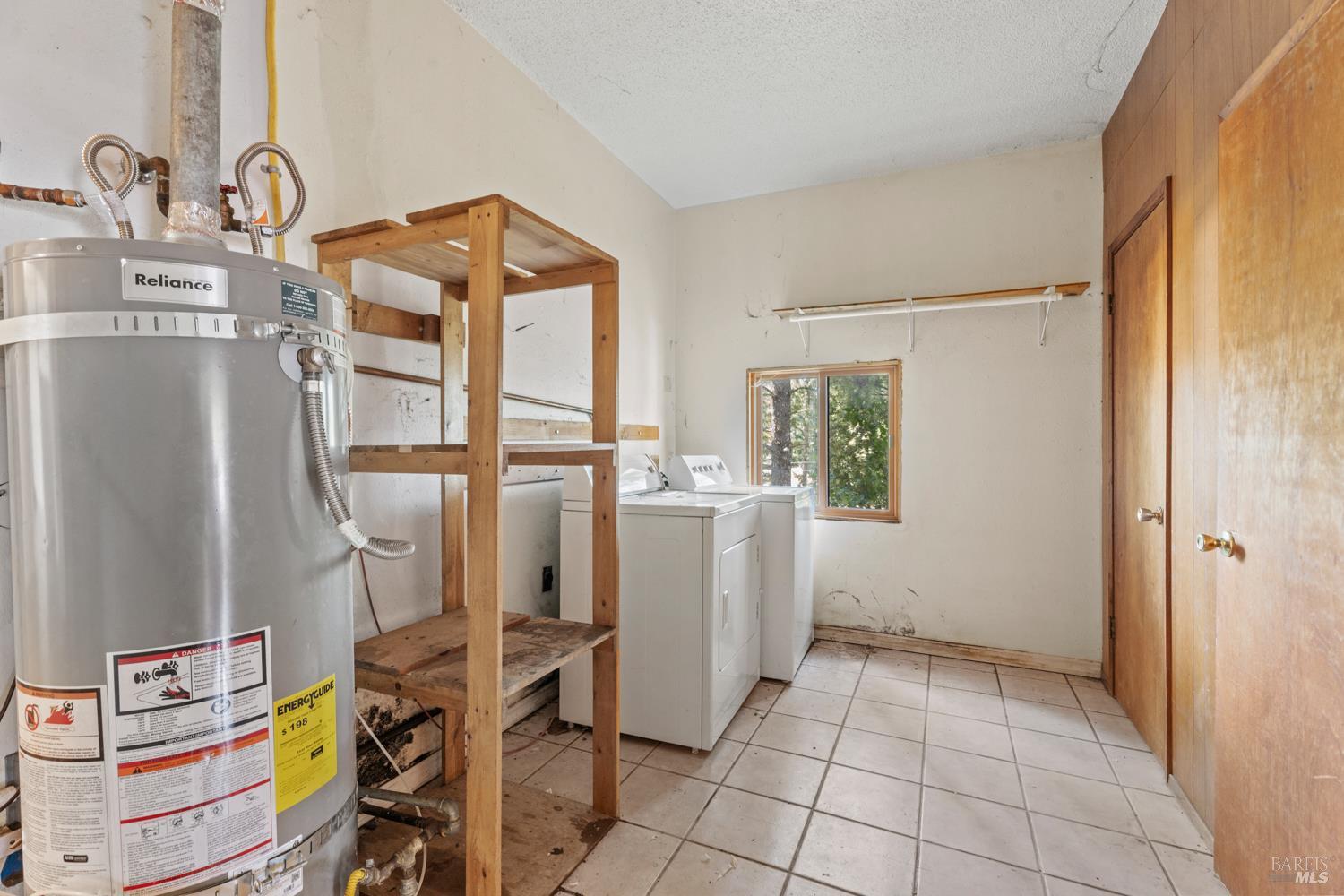 3781 Ridgewood Road Willits, CA 95490 - Photo 17 of 18 a view of a storage & utility room with a window