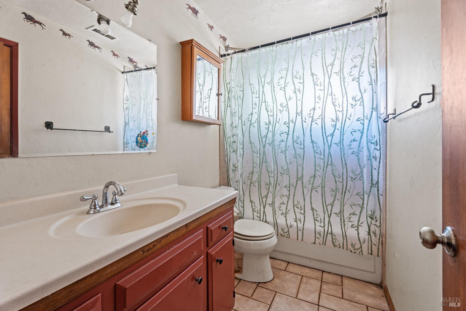 3781 Ridgewood Road Willits, CA 95490 - Photo 7 of 18 a bathroom with a sink toilet and shower