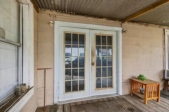 a view of a house with a large window