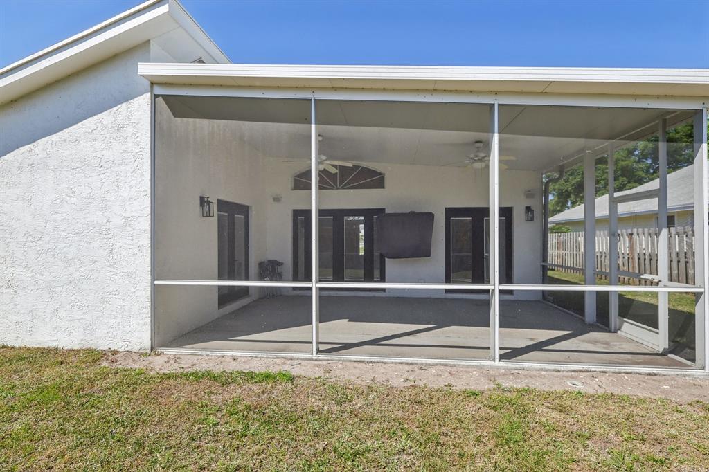 6254 Lucerne Street Jupiter, FL 33458 - Photo 26 of 30 a view of empty room with floor to ceiling windows