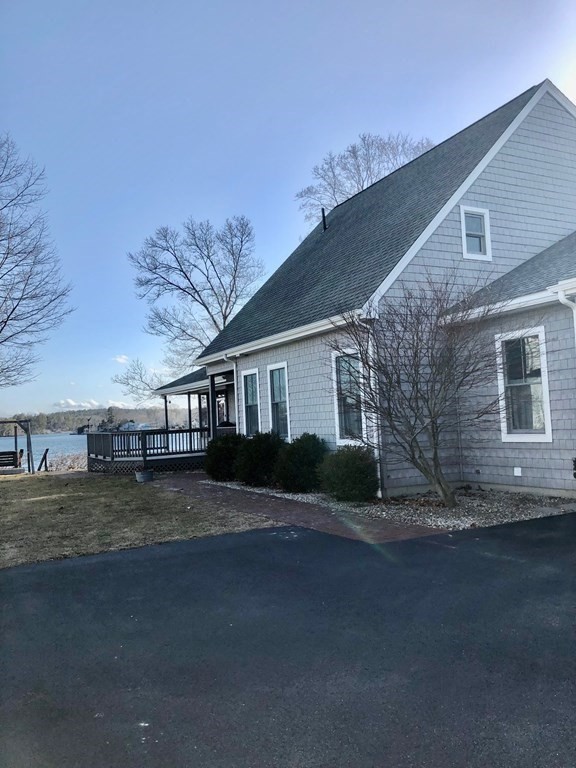 48 Union Point Road Webster, MA 01570 - Photo 7 of 40 a big house with a yard
