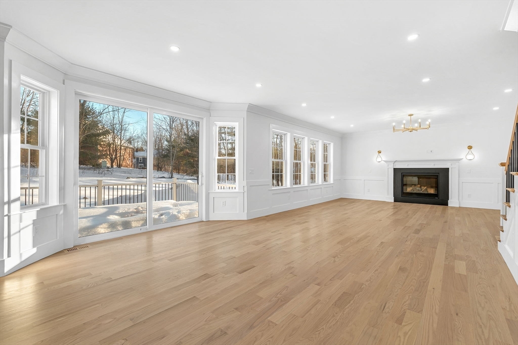 Lot 49 Barnard Hill Road Boylston, MA 01505 - Photo 11 of 26 a view of empty room with a fireplace and windows