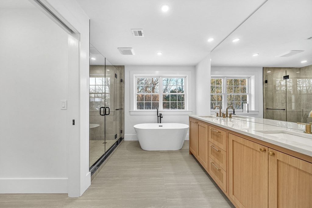 Lot 49 Barnard Hill Road Boylston, MA 01505 - Photo 18 of 26 a large bathroom with a large tub shower and sink