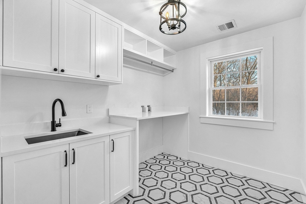 Lot 49 Barnard Hill Road Boylston, MA 01505 - Photo 25 of 26 a kitchen with a sink cabinets and window