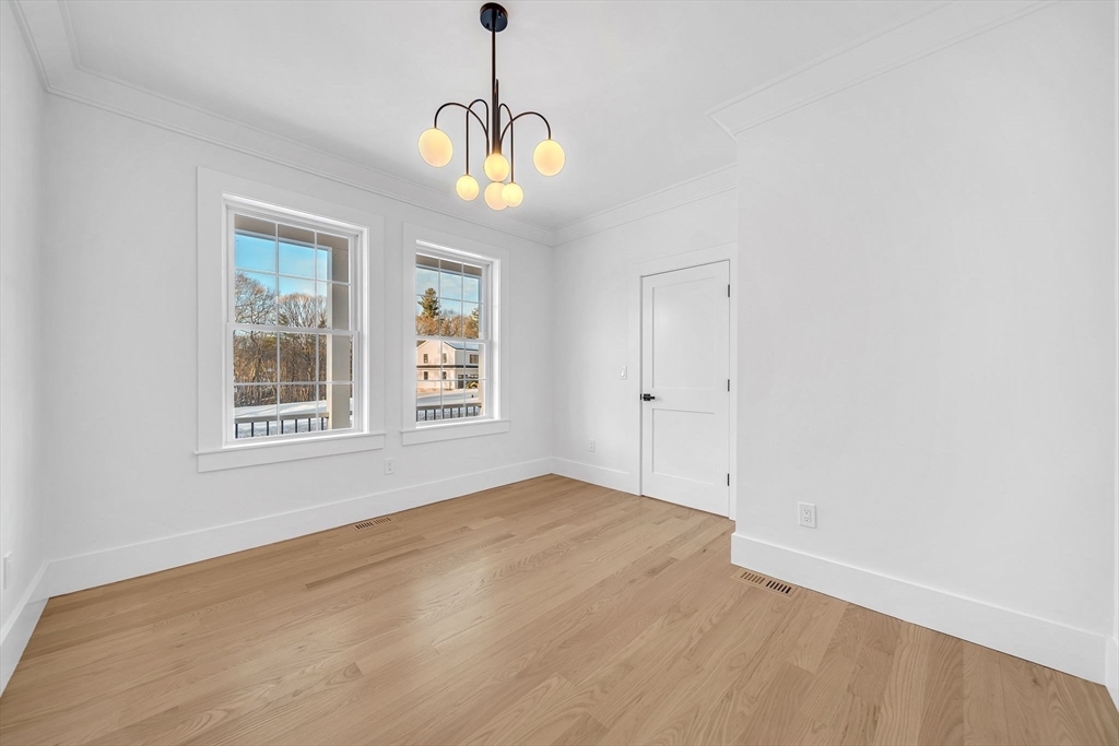 Lot 49 Barnard Hill Road Boylston, MA 01505 - Photo 10 of 26 a view of an empty room with window and chandelier fan
