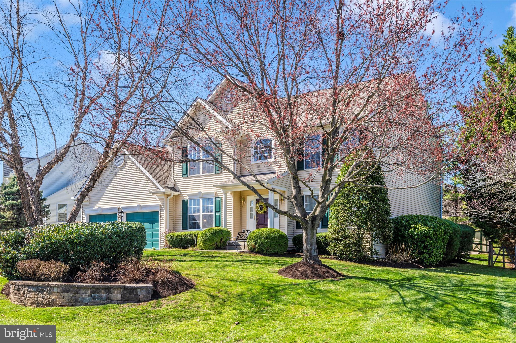8321 Jordan Valley Way Frederick, MD 21702 - Photo 1 of 75 a front view of a house with a yard and trees