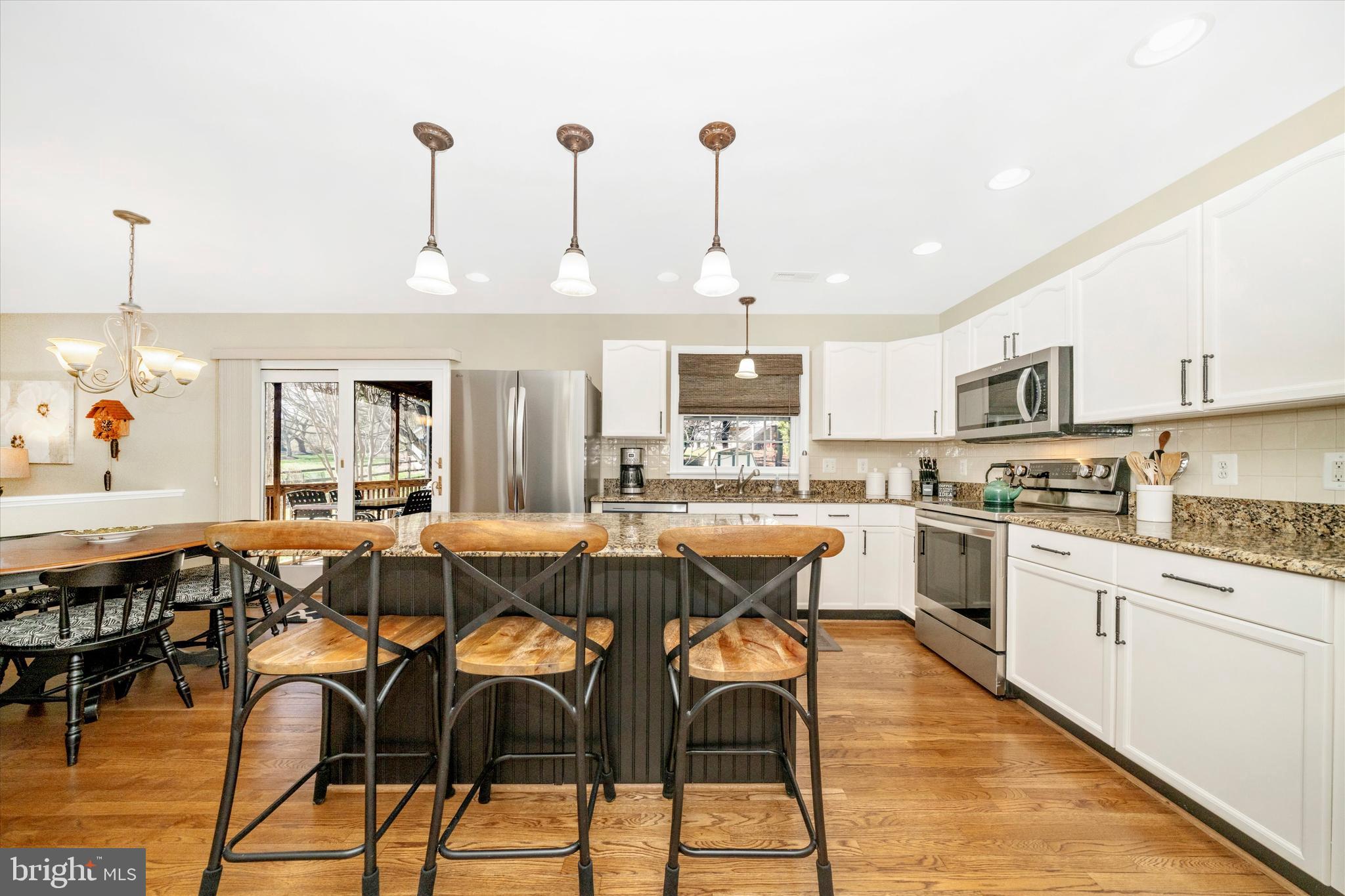 8321 Jordan Valley Way Frederick, MD 21702 - Photo 13 of 75 The huge island is great for casual dining.