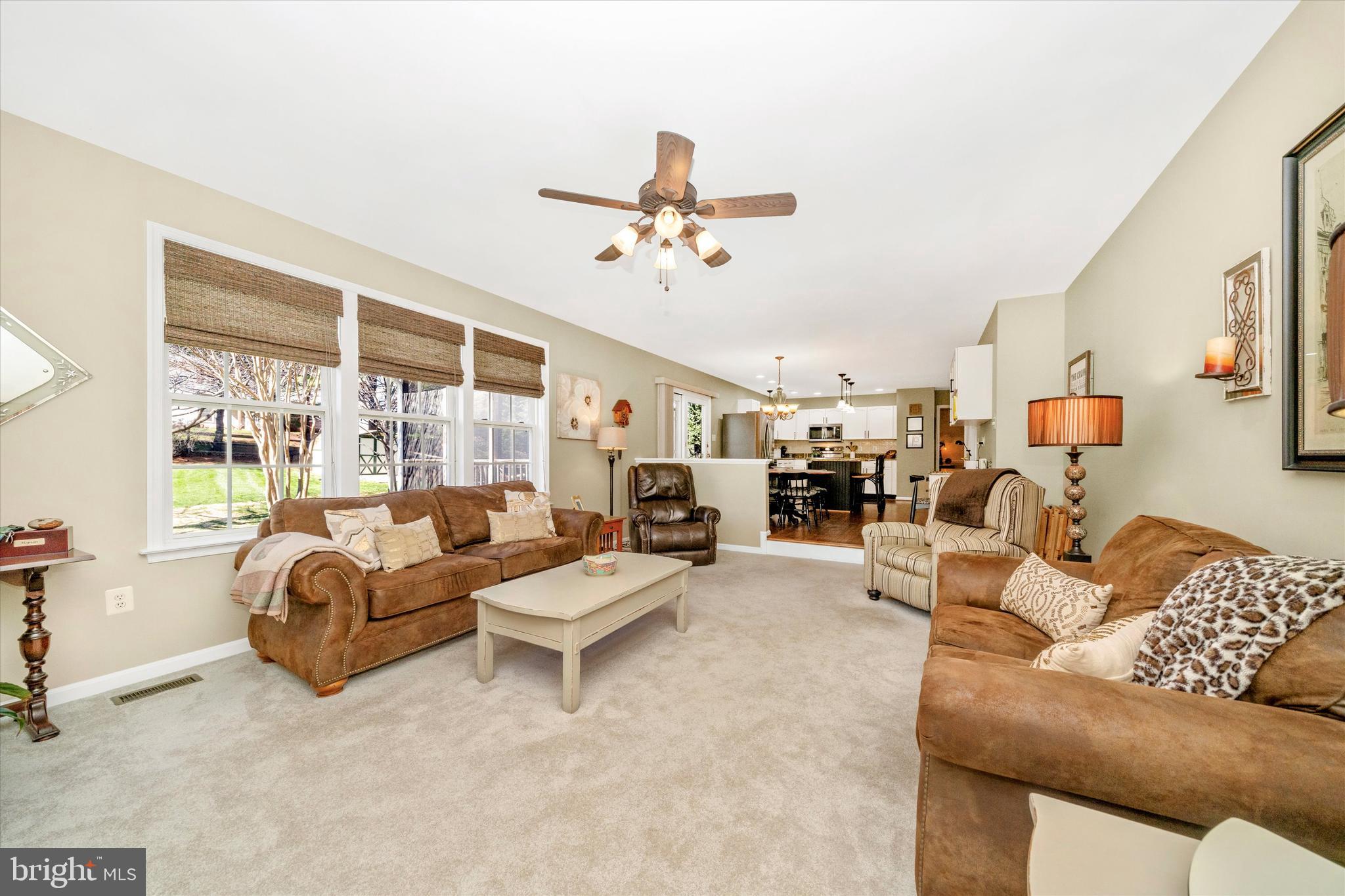 8321 Jordan Valley Way Frederick, MD 21702 - Photo 20 of 75 a living room with furniture and a large window