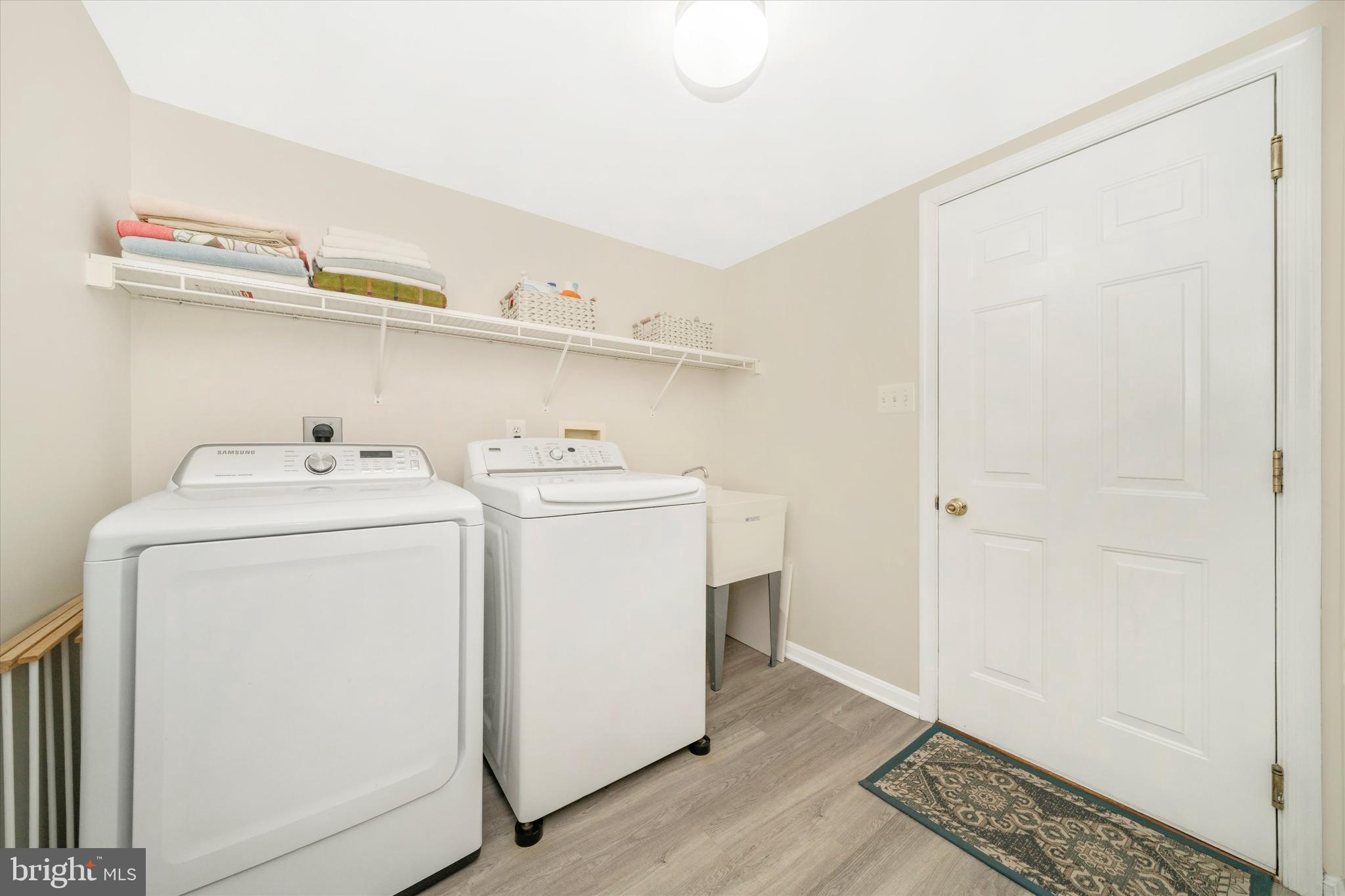 8321 Jordan Valley Way Frederick, MD 21702 - Photo 22 of 75 a utility room with dryer and washer