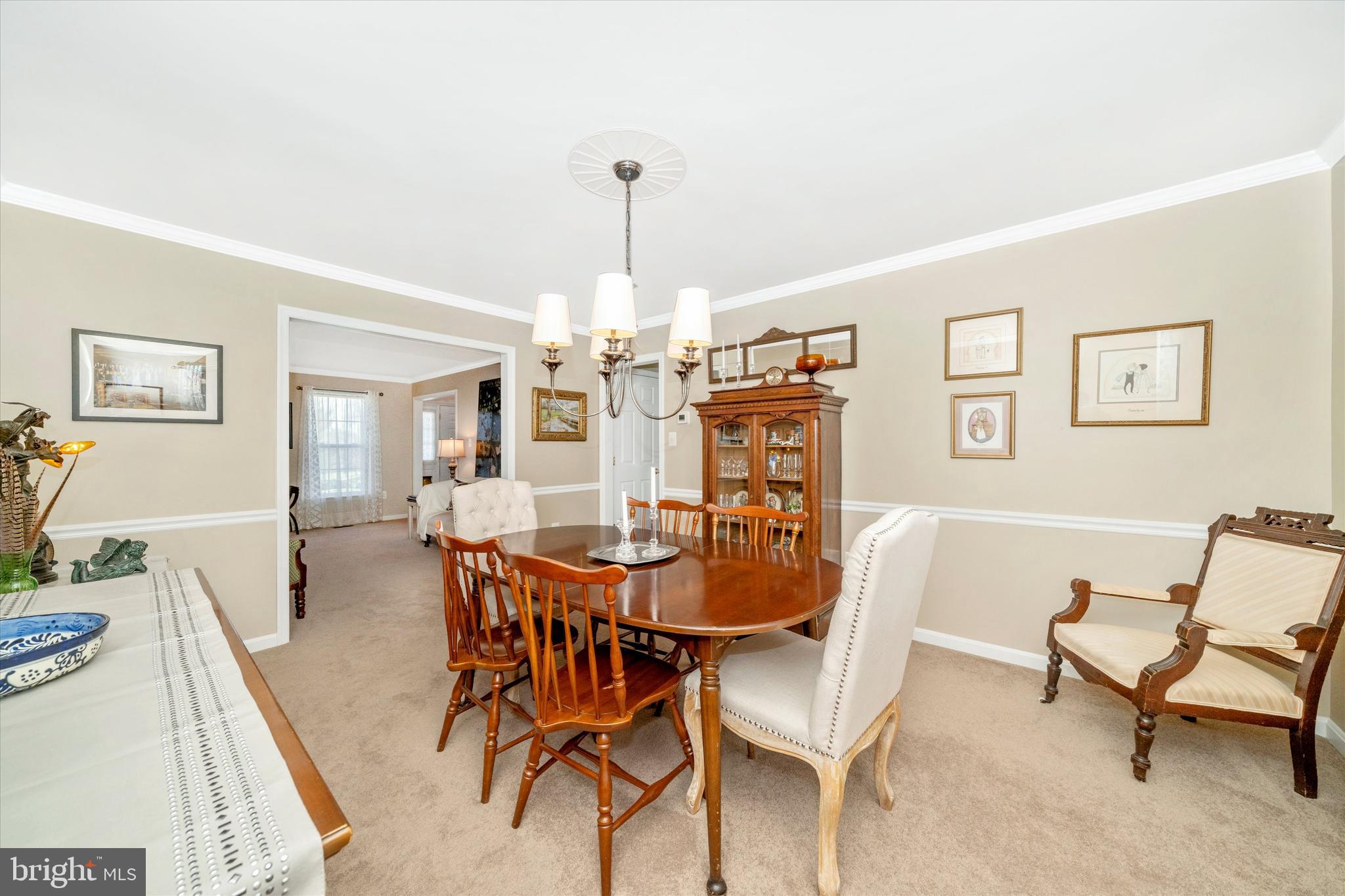 8321 Jordan Valley Way Frederick, MD 21702 - Photo 26 of 75 a view of a dining room with furniture and chandelier