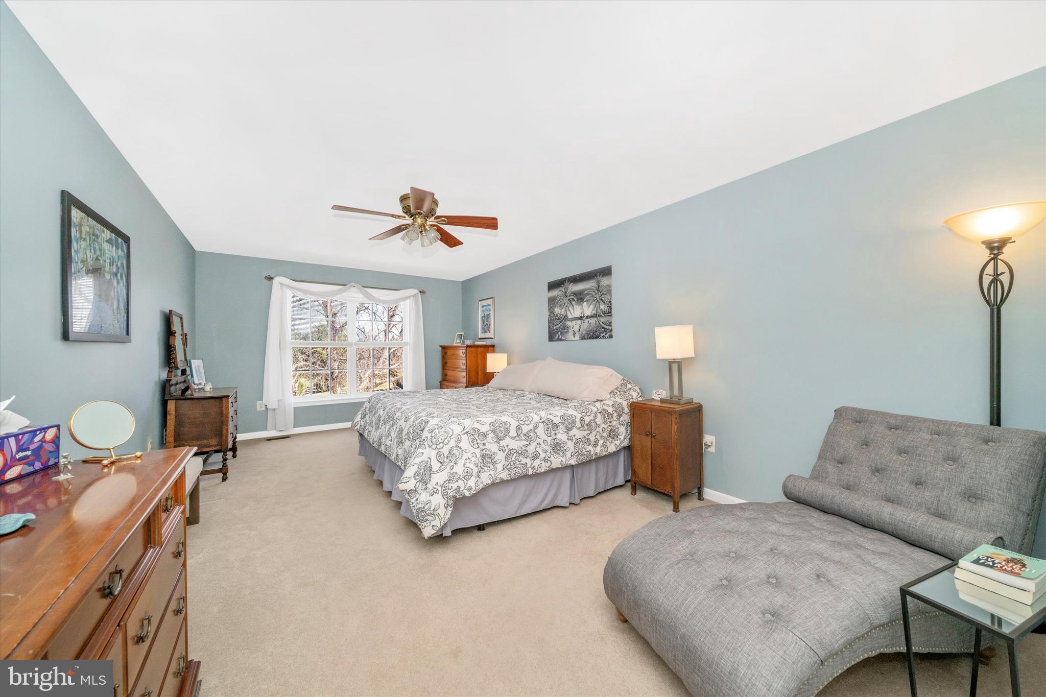 8321 Jordan Valley Way Frederick, MD 21702 - Photo 28 of 75 a bedroom with two beds and a couch