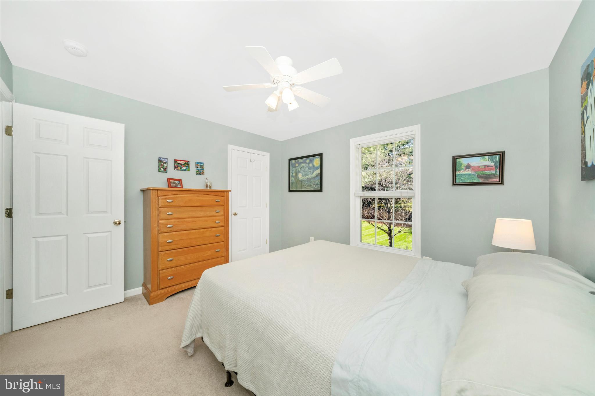 8321 Jordan Valley Way Frederick, MD 21702 - Photo 34 of 75 a bedroom with a bed and a chandelier
