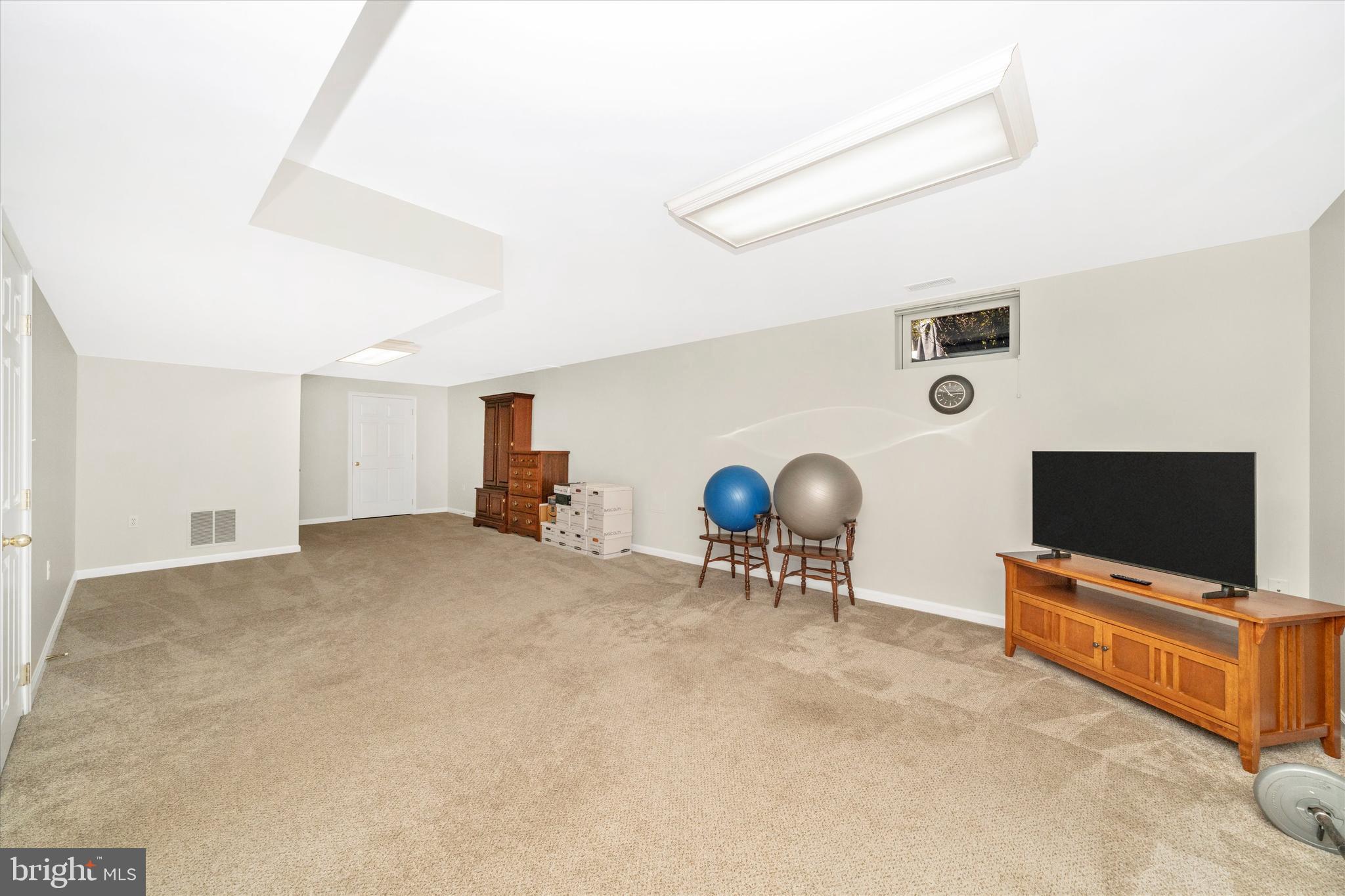 8321 Jordan Valley Way Frederick, MD 21702 - Photo 38 of 75 Heading down to the lower level with flex space...