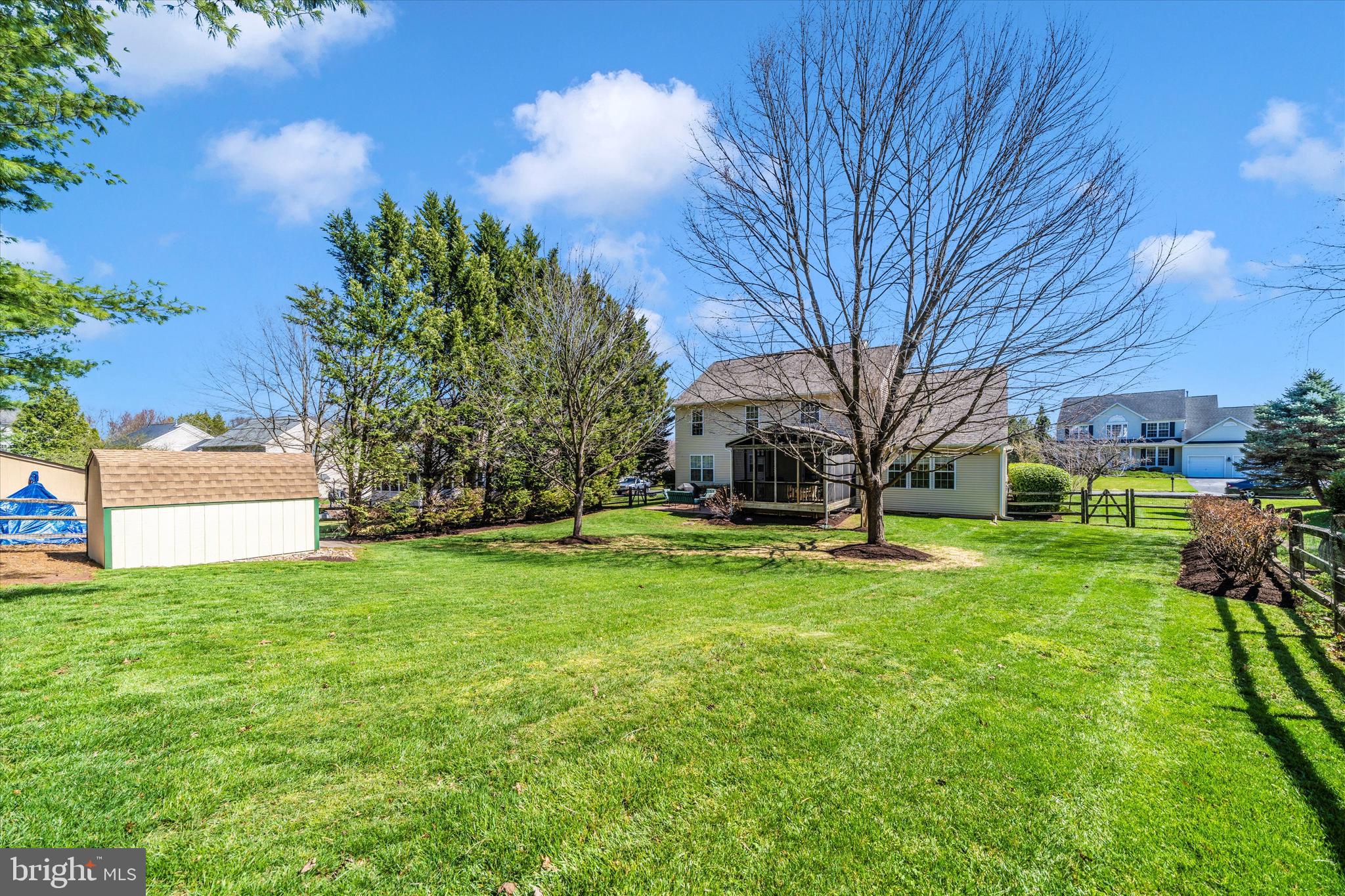 8321 Jordan Valley Way Frederick, MD 21702 - Photo 49 of 75 a view of a yard with a house in the background