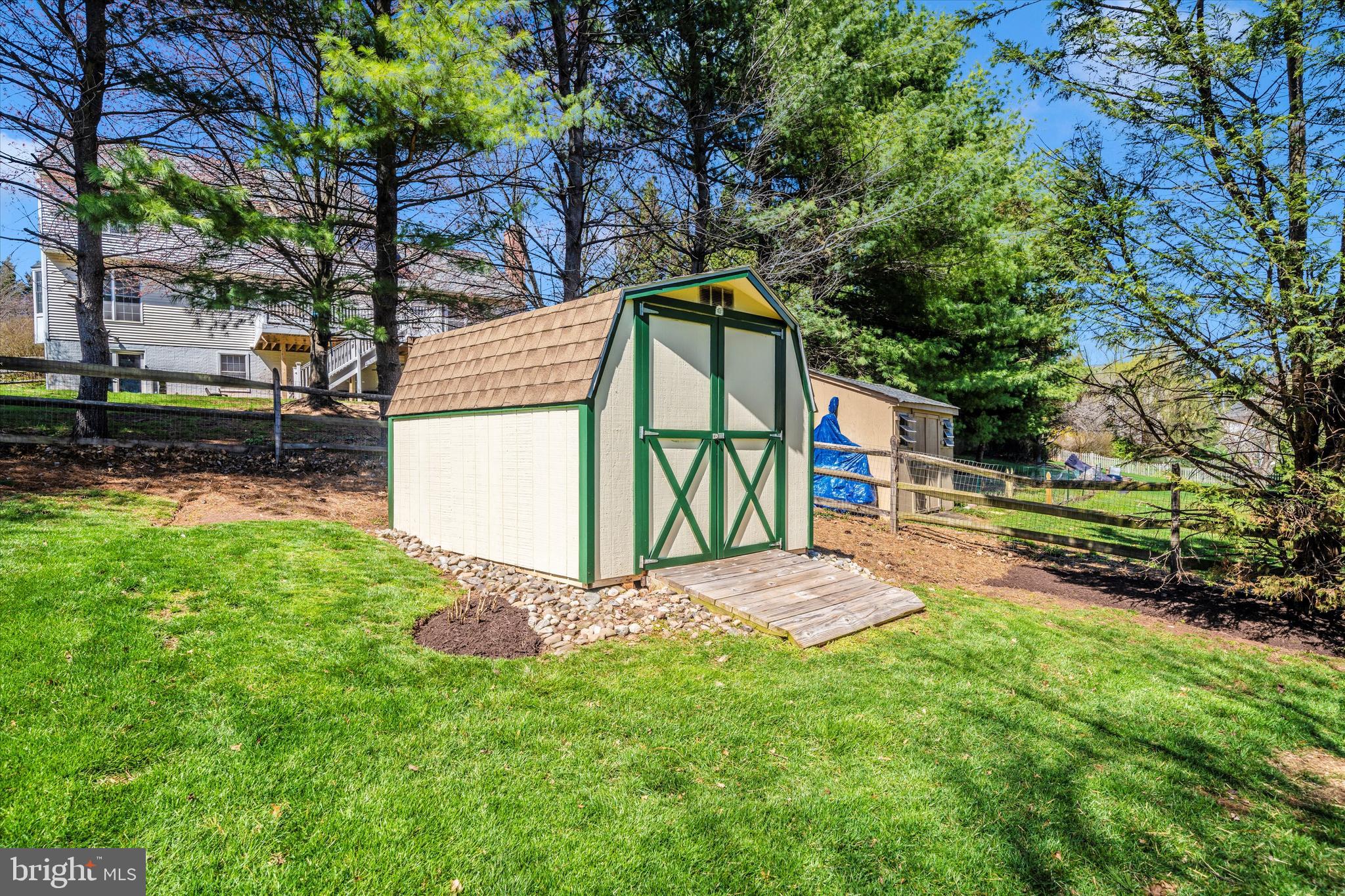 8321 Jordan Valley Way Frederick, MD 21702 - Photo 51 of 75 a backyard of a house with wooden floor and fence