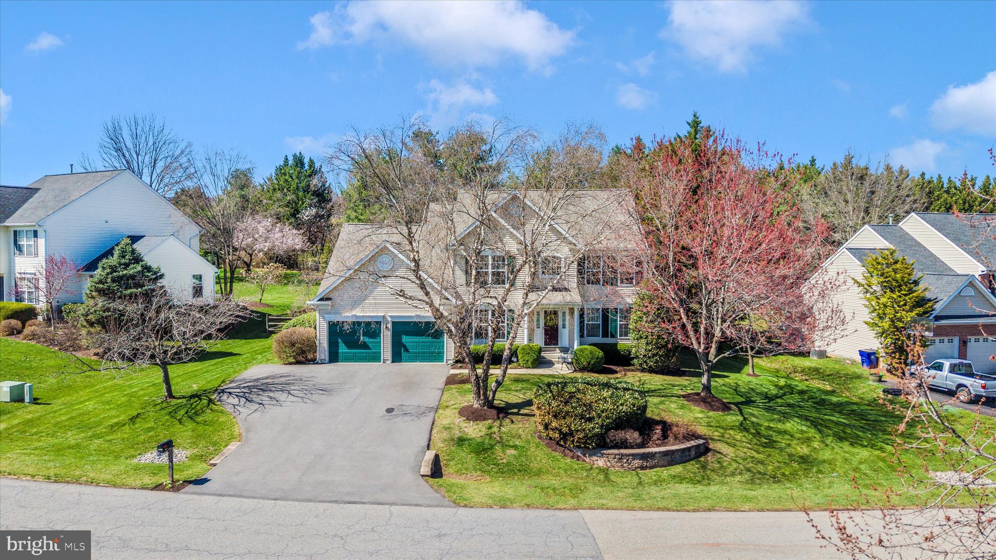 8321 Jordan Valley Way Frederick, MD 21702 - Photo 55 of 75 a front view of a house with a yard and outdoor seating