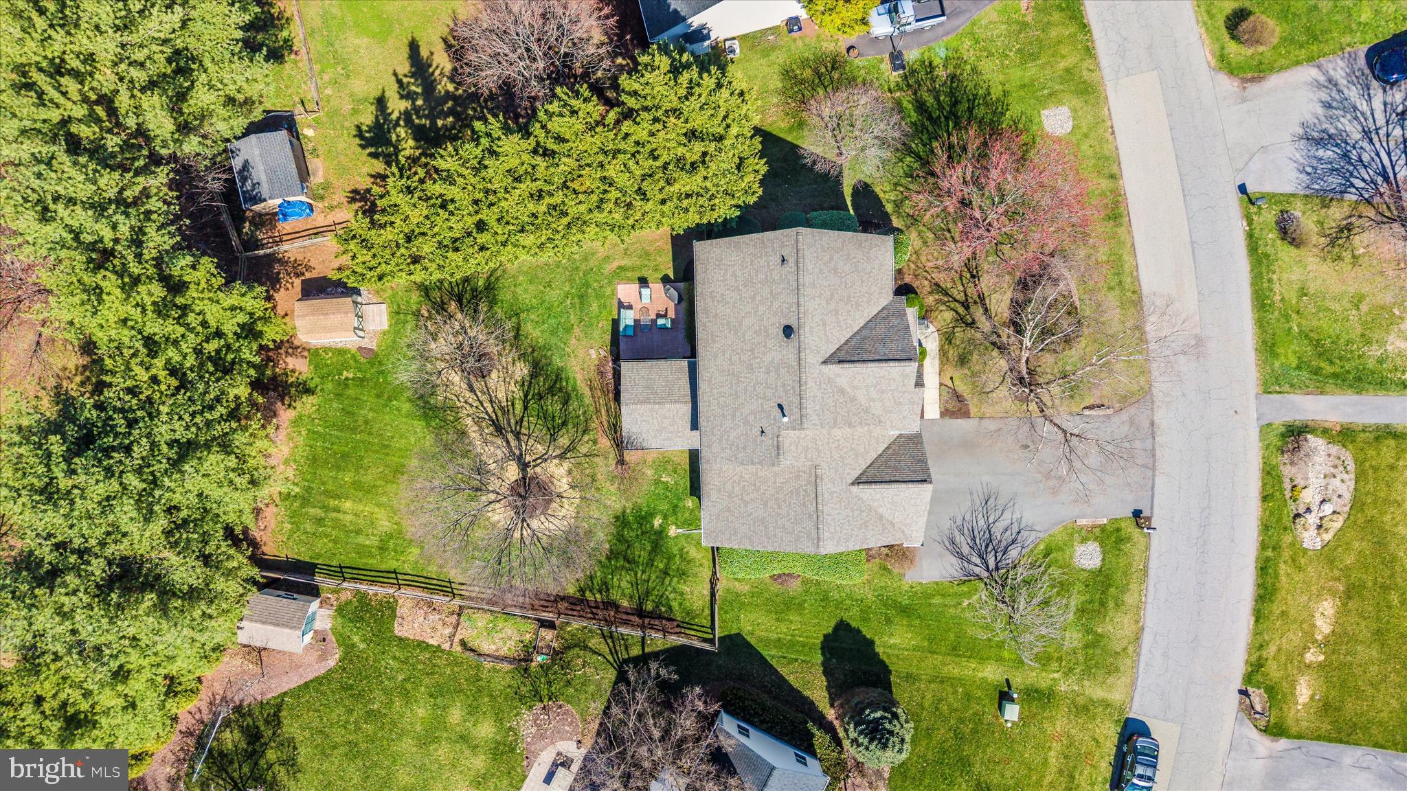 8321 Jordan Valley Way Frederick, MD 21702 - Photo 58 of 75 an aerial view of a house with a yard and garden