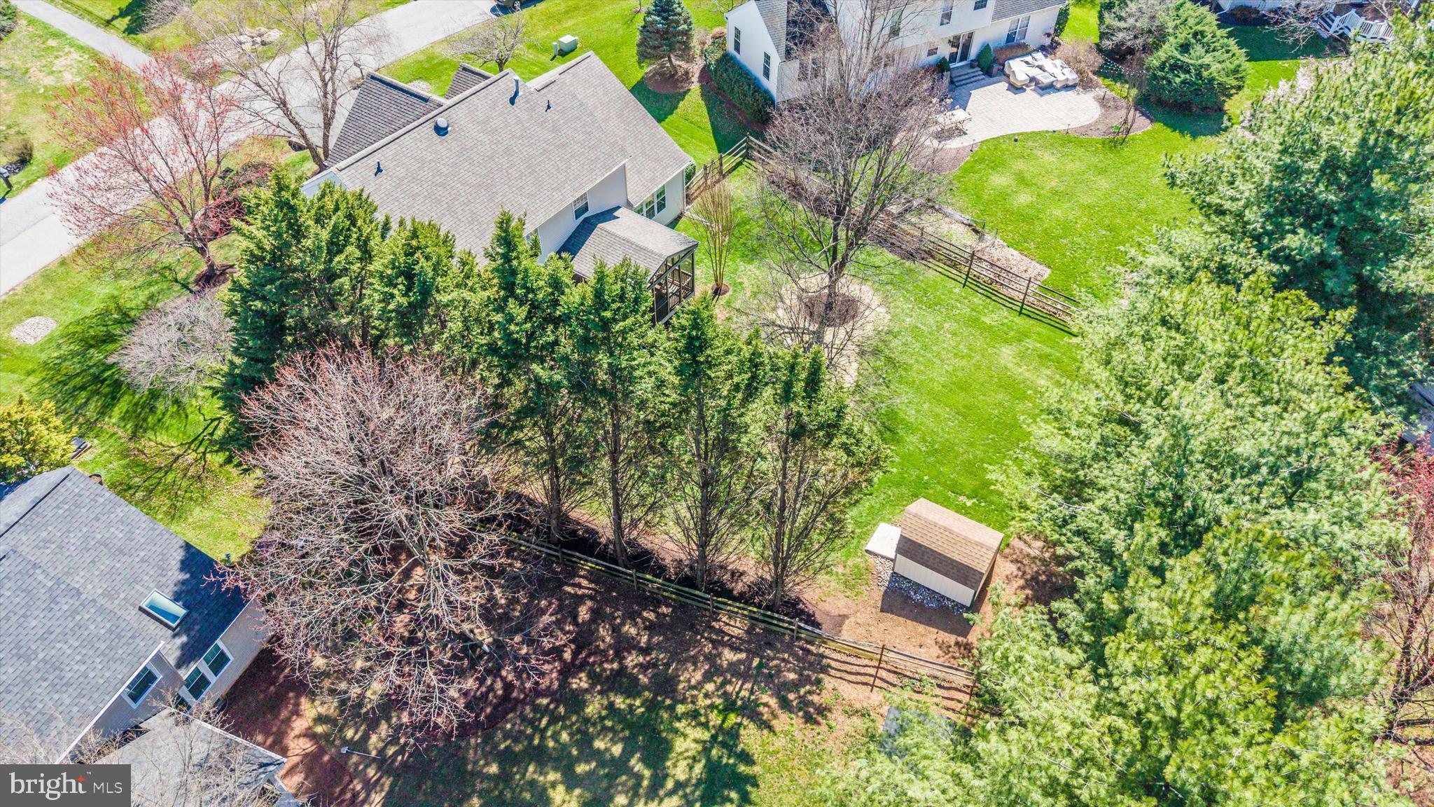 8321 Jordan Valley Way Frederick, MD 21702 - Photo 59 of 75 an aerial view of a house with a yard and garden