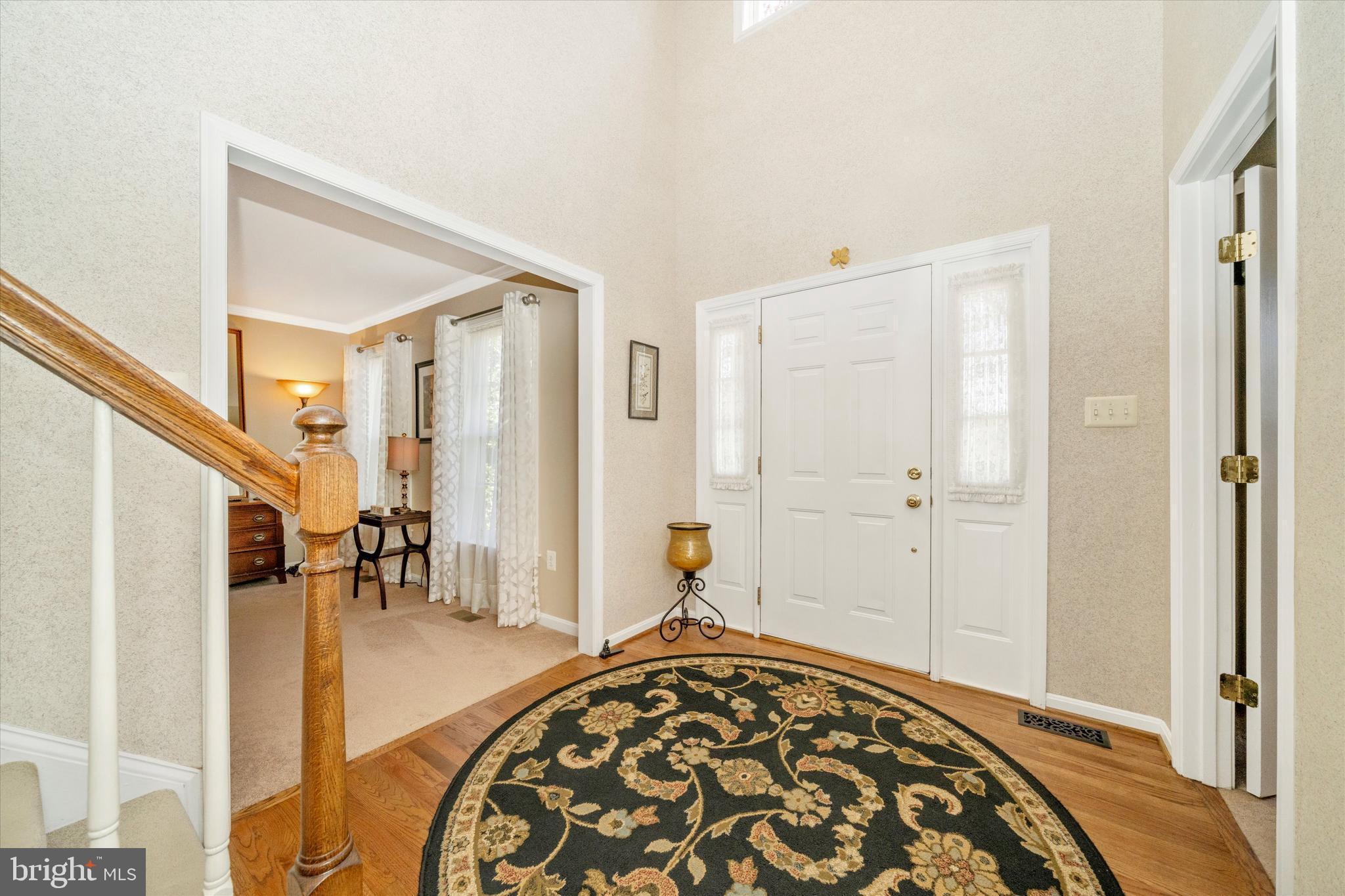 8321 Jordan Valley Way Frederick, MD 21702 - Photo 6 of 75 Featuring a large foyer and hardwood floors.