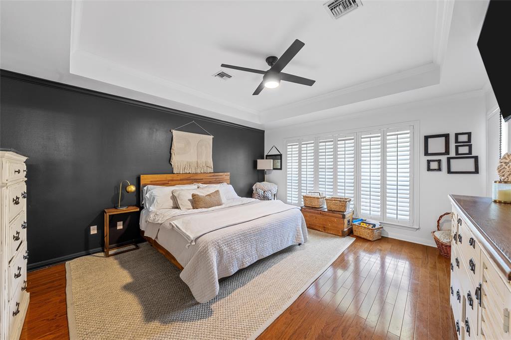 3000 Chimney Hill Drive Waco, TX 76708 - Photo 13 of 37 a bedroom with a bed and wooden floor
