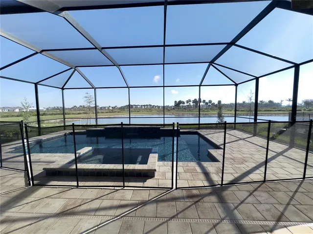 a view of a yard with a sitting area