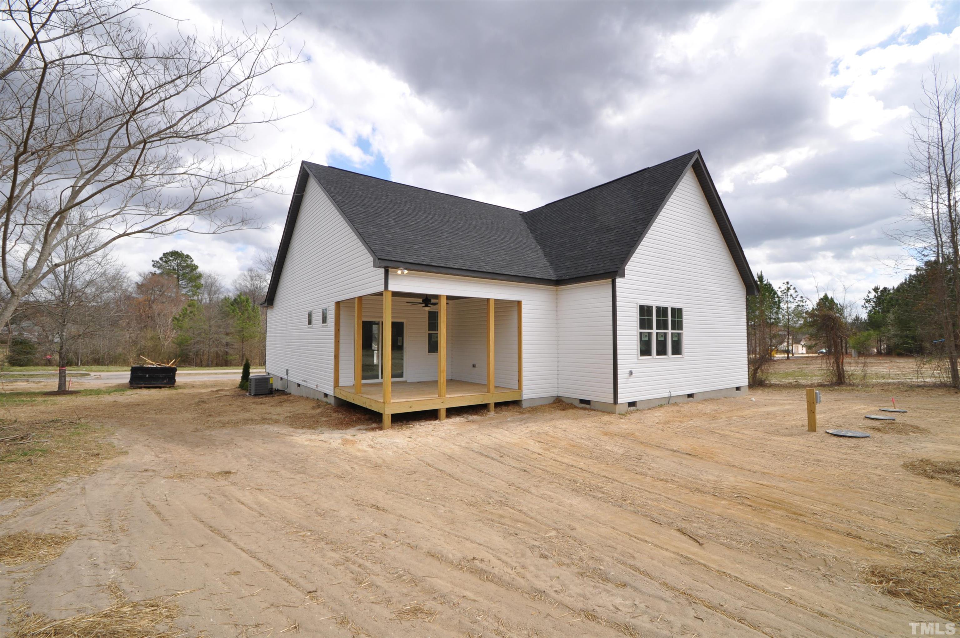 10 Pilot Ridge Road Zebulon, NC 27597 - Photo 8 of 8 a view of a house with a yard