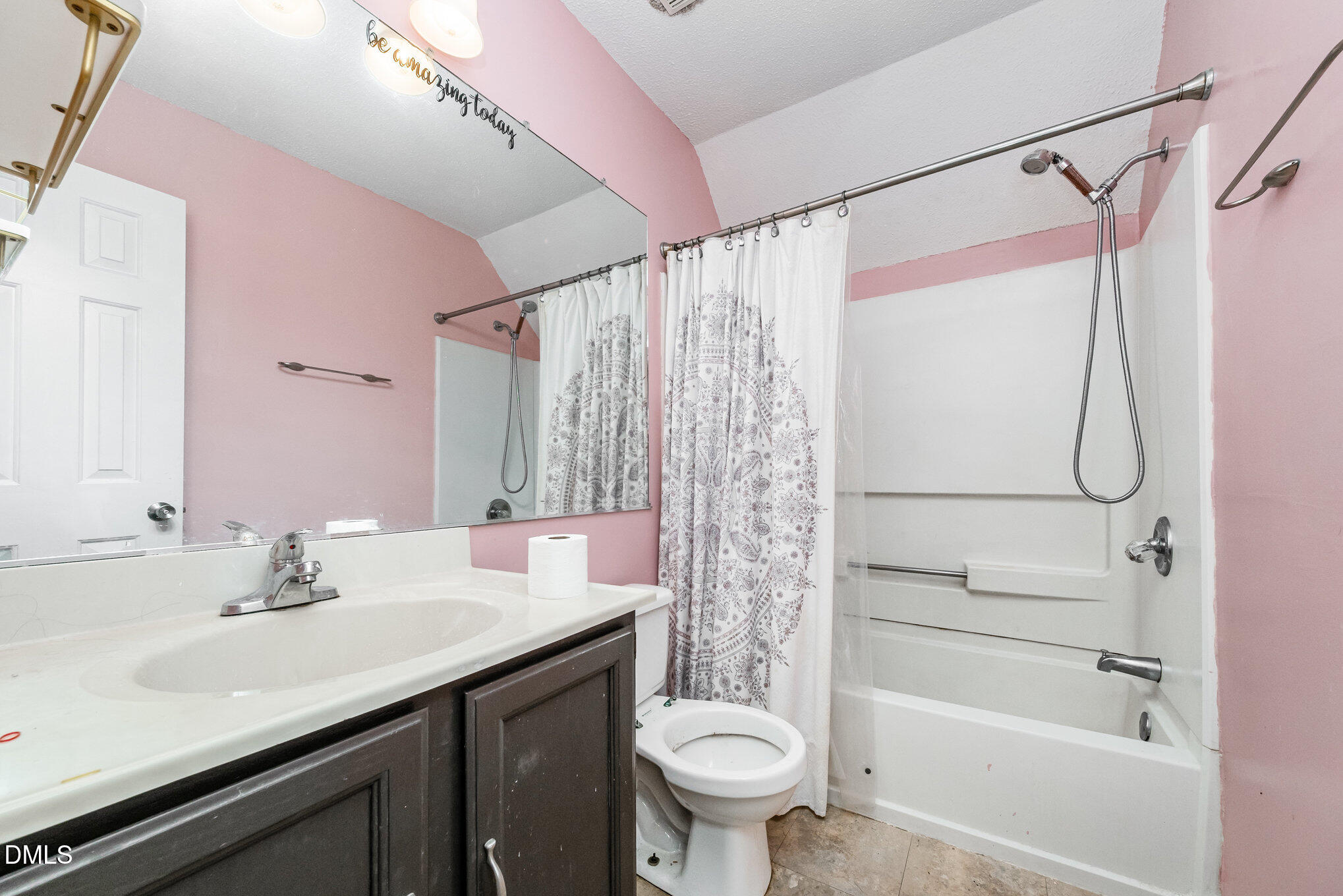 153 Abercrombie Road Wake Forest, NC 27587 - Photo 11 of 18 a bathroom with a sink a toilet and shower