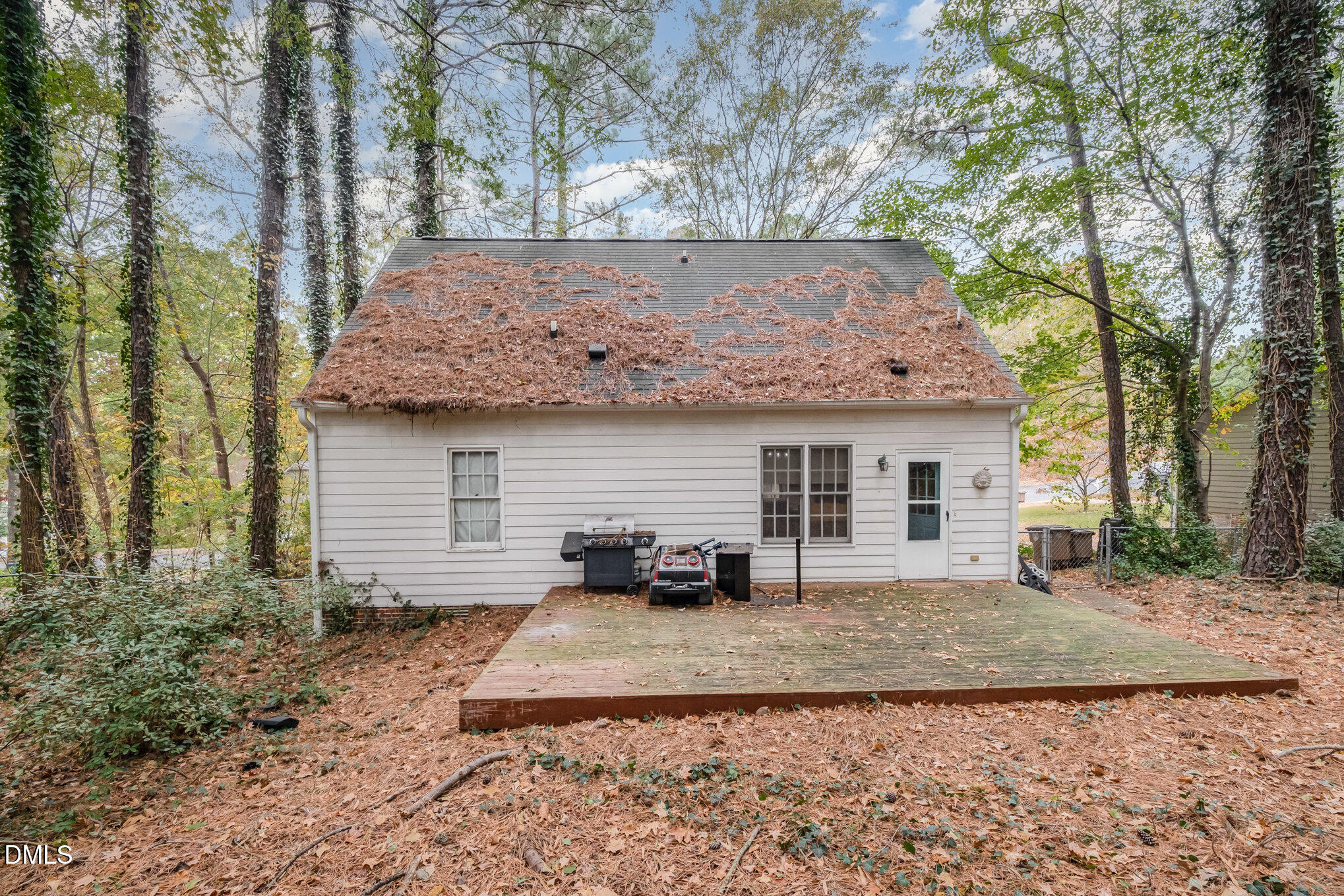 153 Abercrombie Road Wake Forest, NC 27587 - Photo 16 of 18 a view of a house with a yard and garage