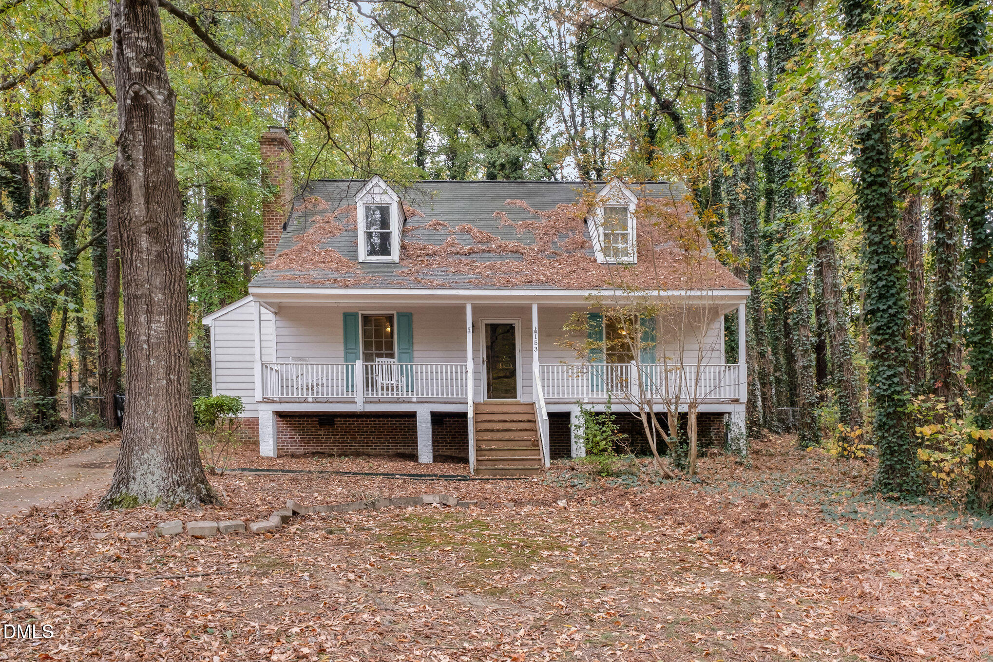 153 Abercrombie Road Wake Forest, NC 27587 - Photo 18 of 18 a front view of a house with a yard and garage