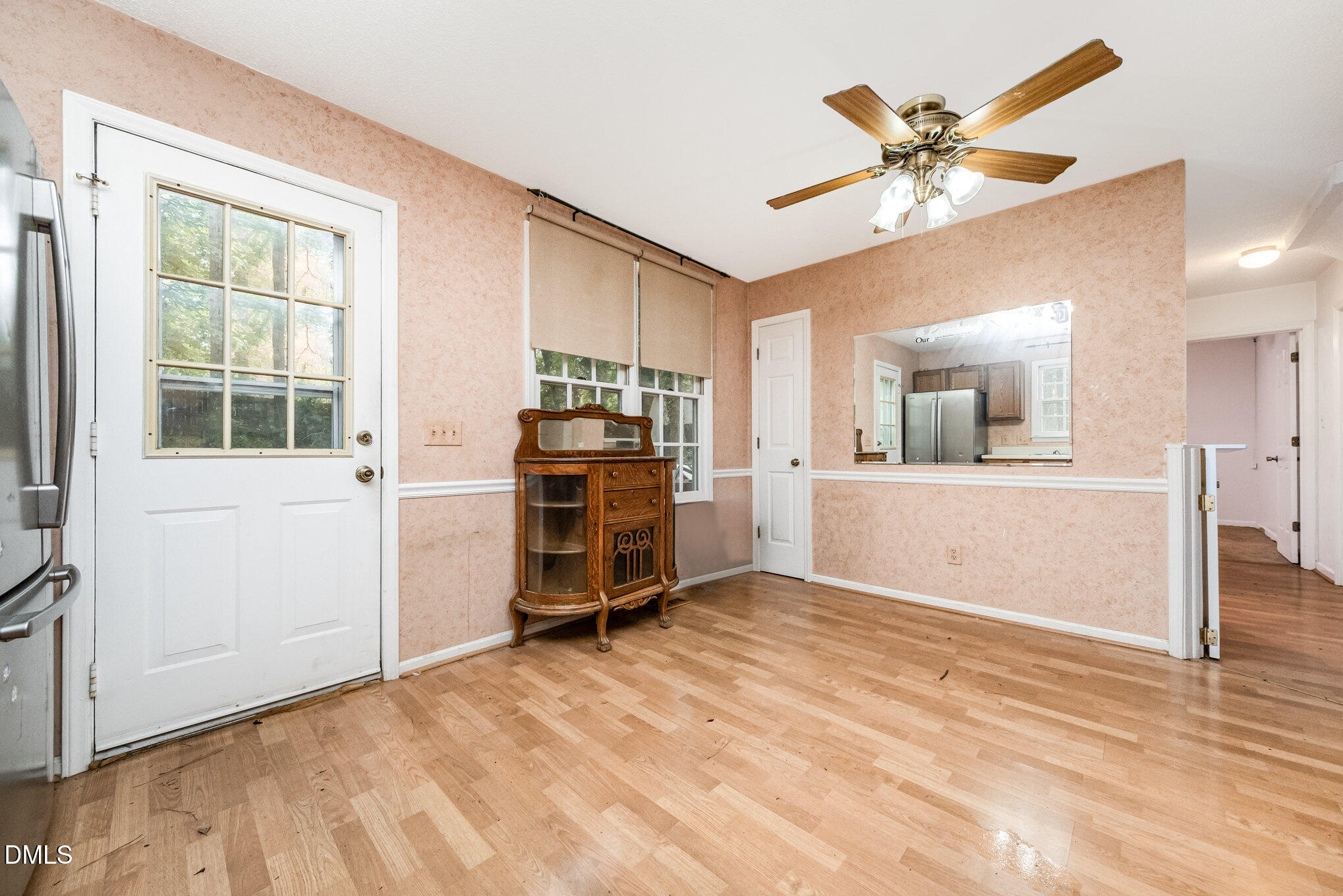 153 Abercrombie Road Wake Forest, NC 27587 - Photo 8 of 18 an empty room with a empty space and windows
