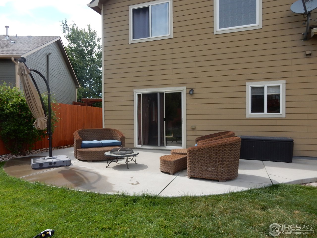8712 18th St Road Greeley, CO 80634 - Photo 15 of 22 Backyard Patio
