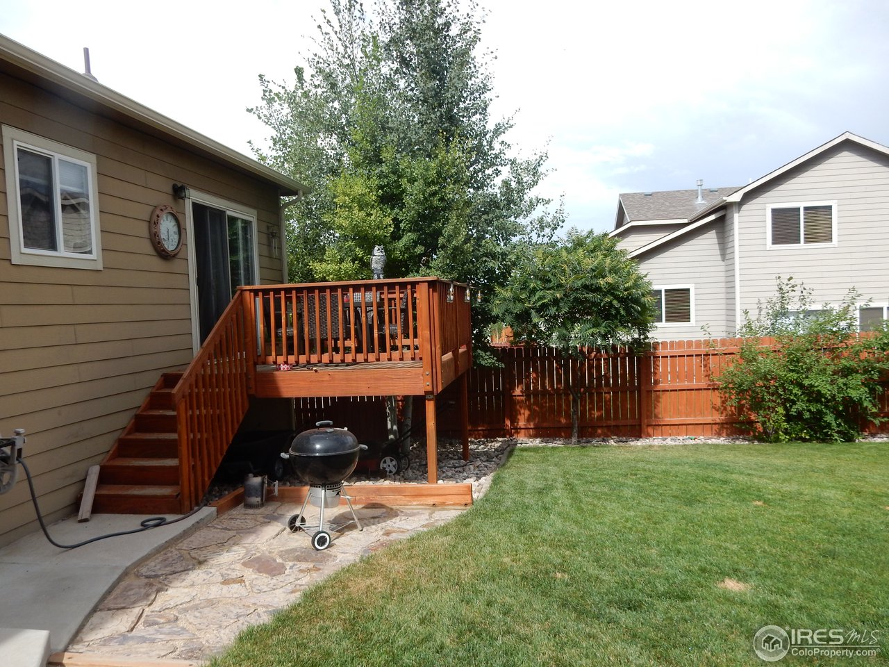 8712 18th St Road Greeley, CO 80634 - Photo 16 of 22 Backyard Deck