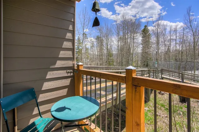 a view of a balcony with chairs