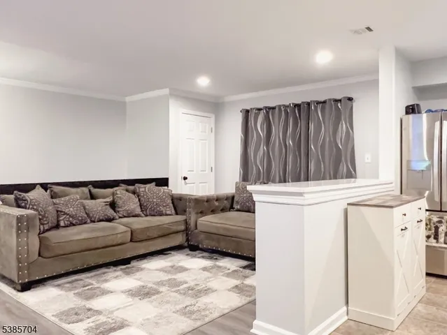 a living room with furniture and a couch