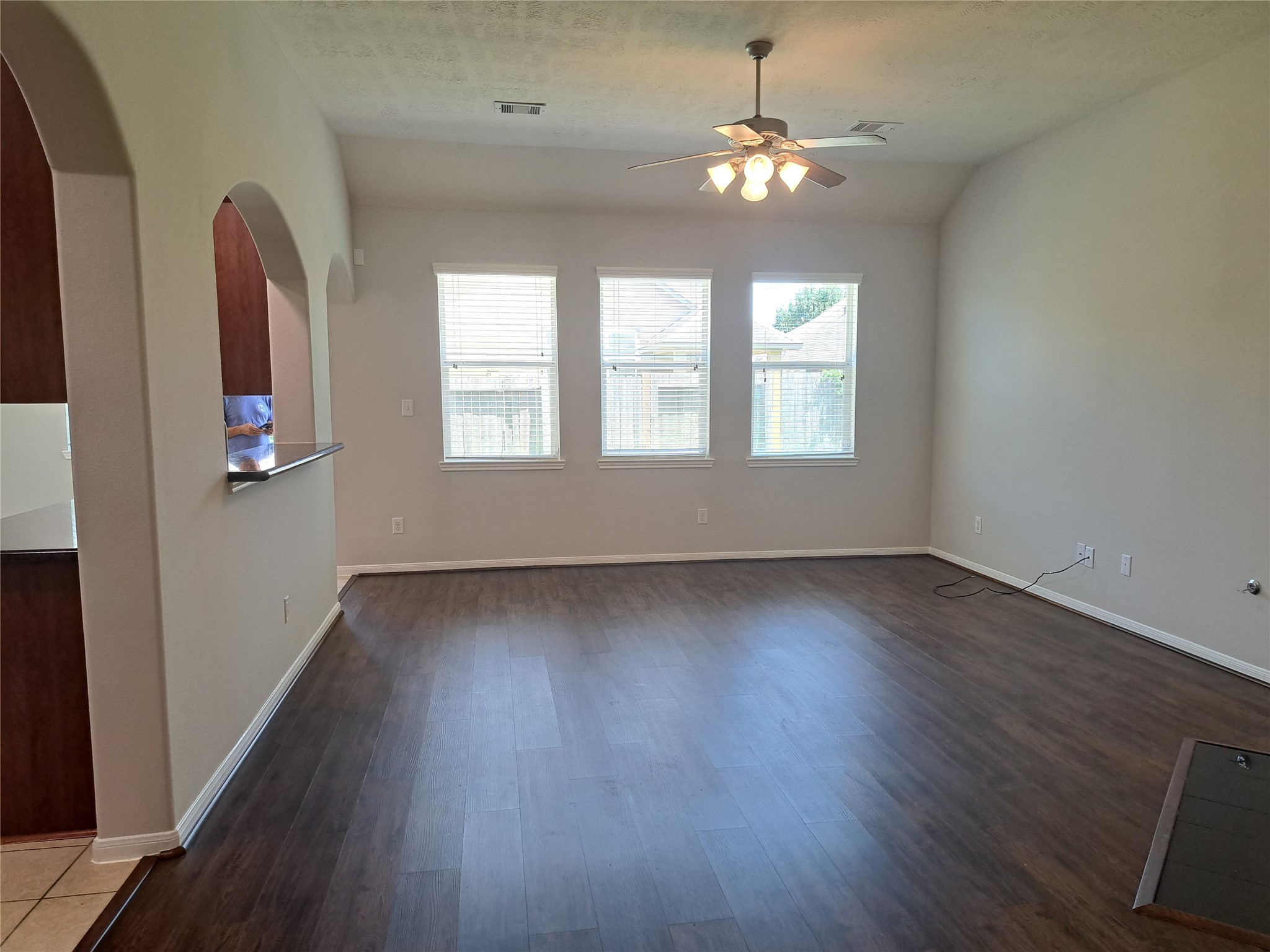 26315 Fox Ridge Lane Katy, TX 77494 - Photo 8 of 39 an empty room with wooden floor and windows
