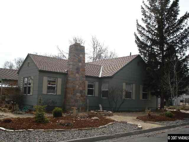 1303 Patrick Avenue Reno, NV 89509 - Photo 3 of 5 a front view of a house with garden
