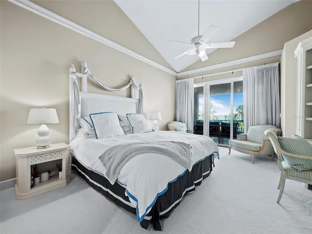 a kitchen with stainless steel appliances a sink a stove a refrigerator and cabinets