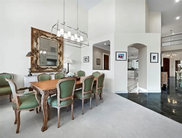 a bedroom with a bed and a table