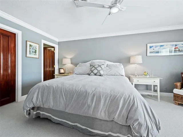 a view of swimming pool with a yard and plants