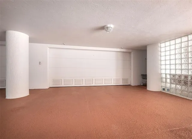 a view of a garden with a fountain