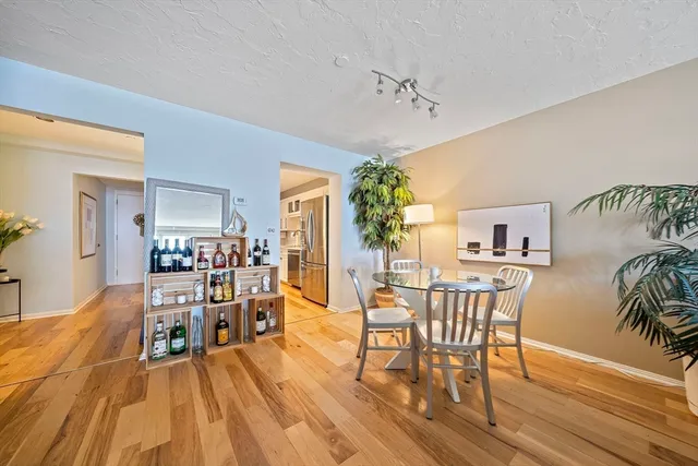a workspace with furniture and a potted plant